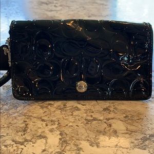 Coach shiny black wallet with wrist strap